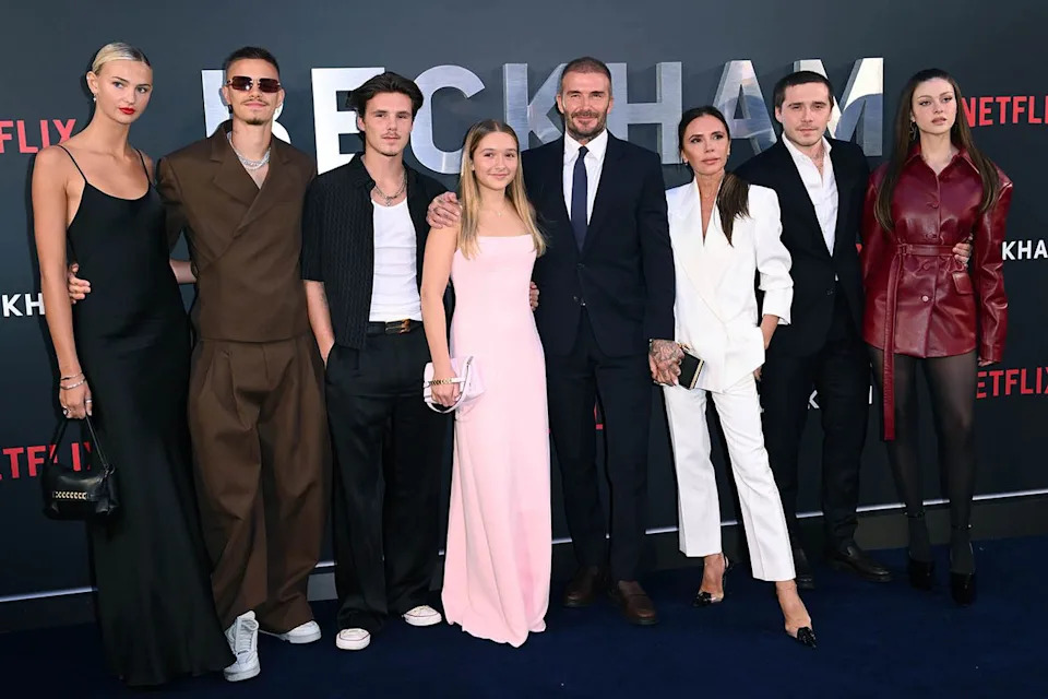 Mia Regan, Romeo Beckham, Cruz Beckham, Harper Beckham, David Beckham, Victoria Beckham, Brooklyn Peltz Beckham and Nicola Peltz Beckham are pictured in October 2023Credit: Karwai Tang/WireImage