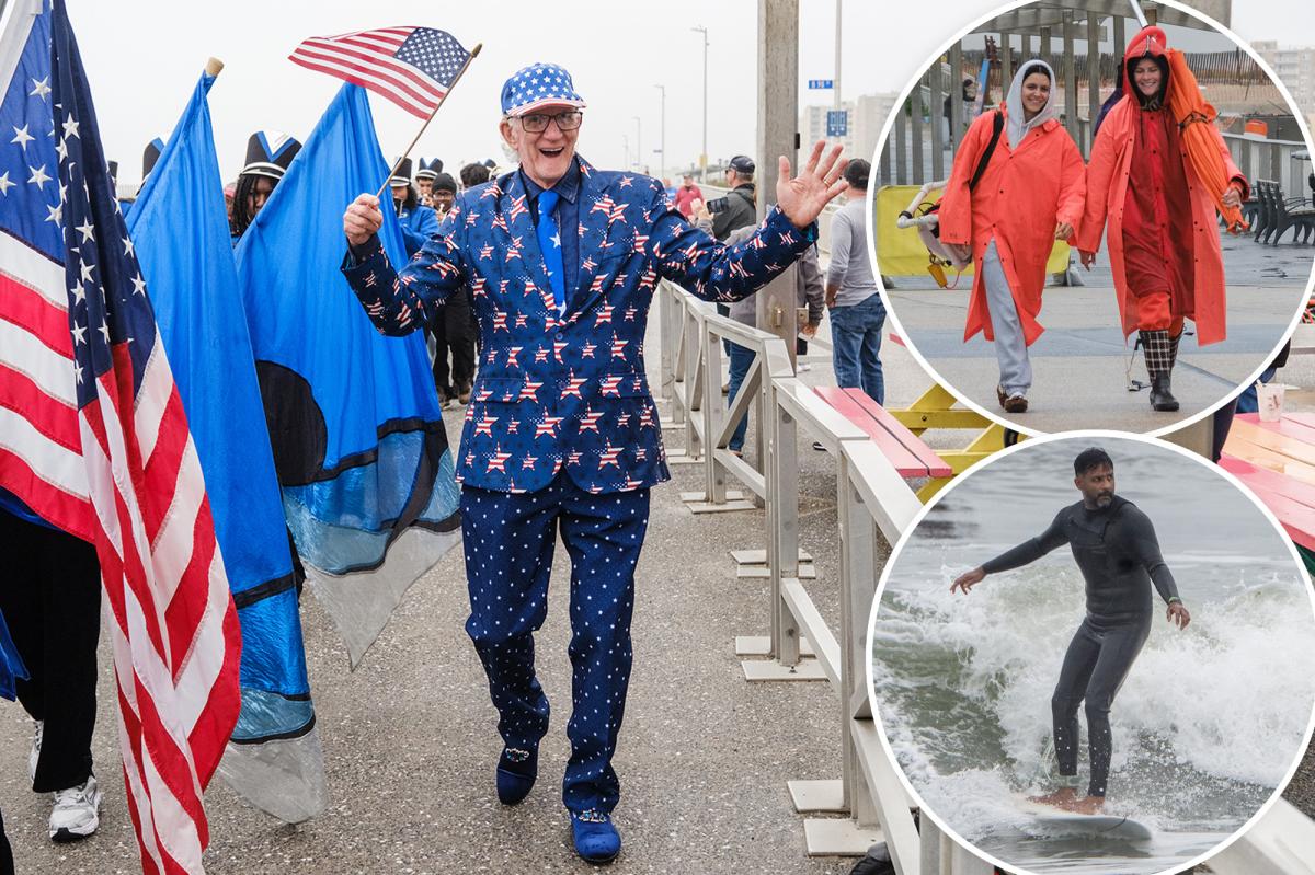 Wet Memorial Day scares off NYC beach crowds -- but diehard locals stick it out