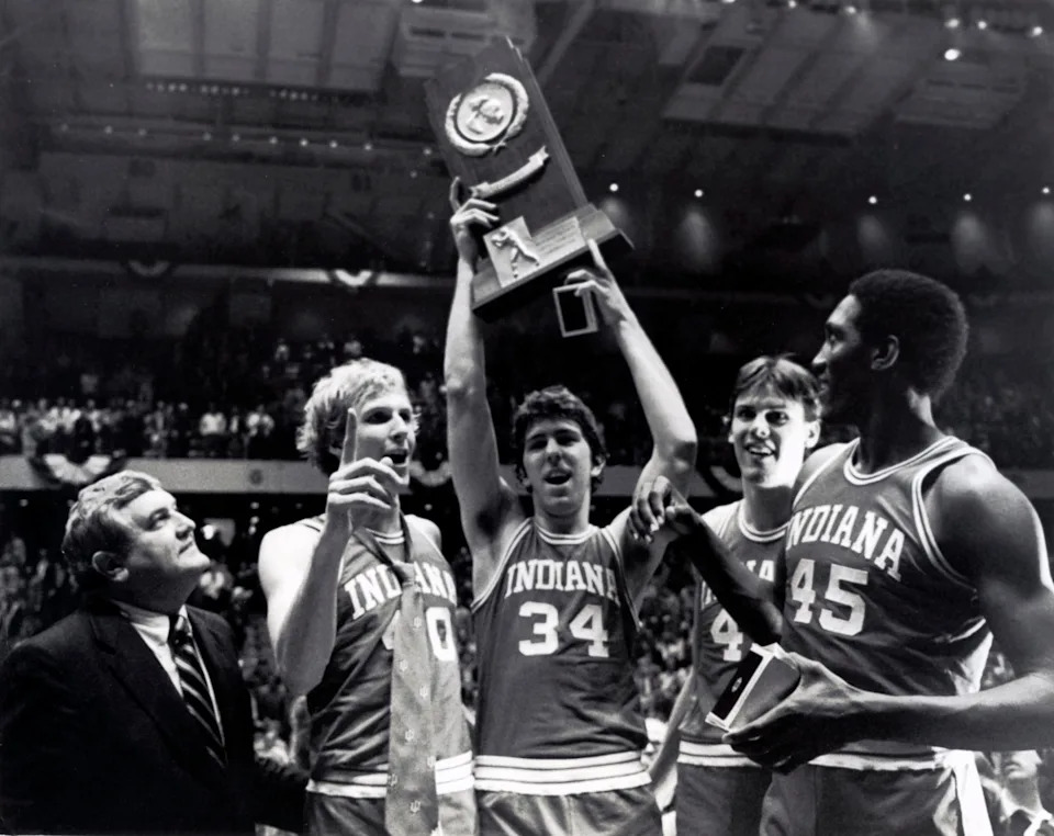 Mar 30, 1981; Philadelphia, PA, USA; FILE PHOTO; Indiana Hoosiers forward Glen Grunwald (40) Steve Risley (34) and Ray Tolbert (45) celebrate with the trophy after a victory against the North Carolina Tarheels during the 1981 Final Four. Indiana defeated North Carolina 63-50. Mandatory Credit: Malcolm Emmons-USA TODAY Sports