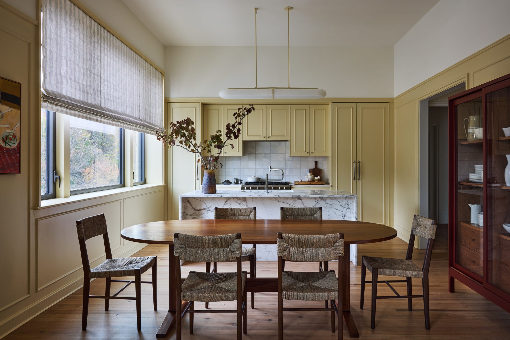 Modern kitchen and dining area with natural light