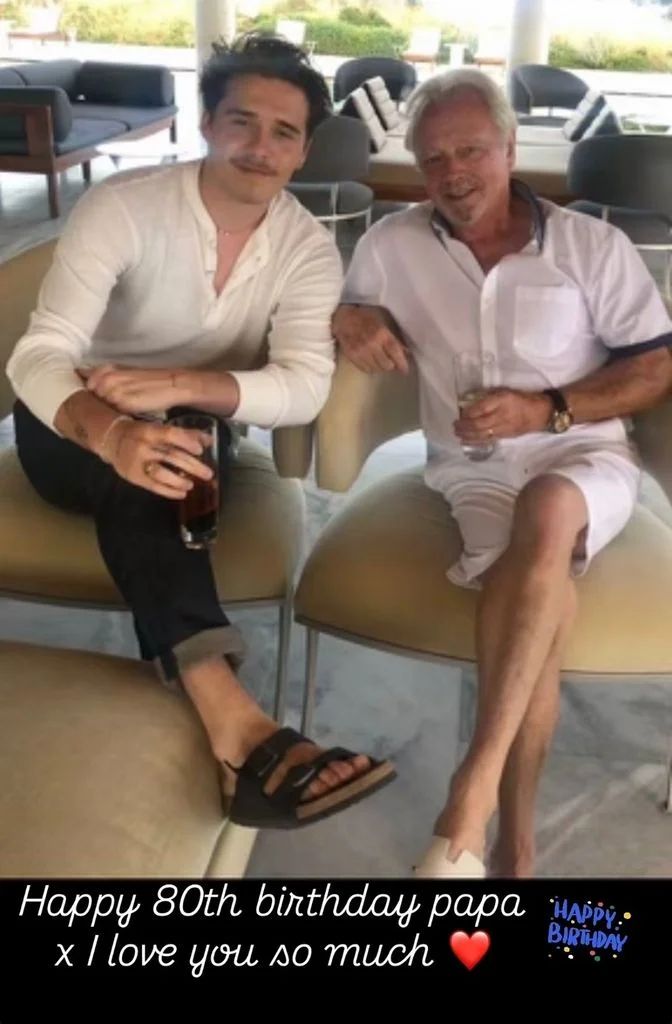 Brooklyn Beckham with his maternal grandfather, 'Tony' Adams