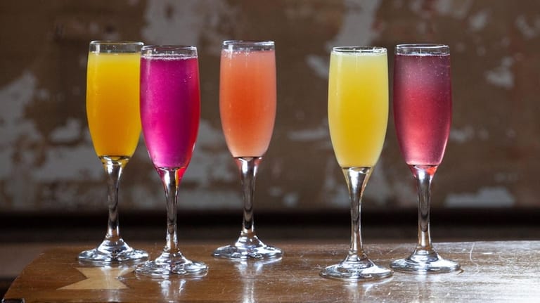 Colorful, fruit-flavored mimosas at Coastal Kitchen & Daiquiri Bar in...