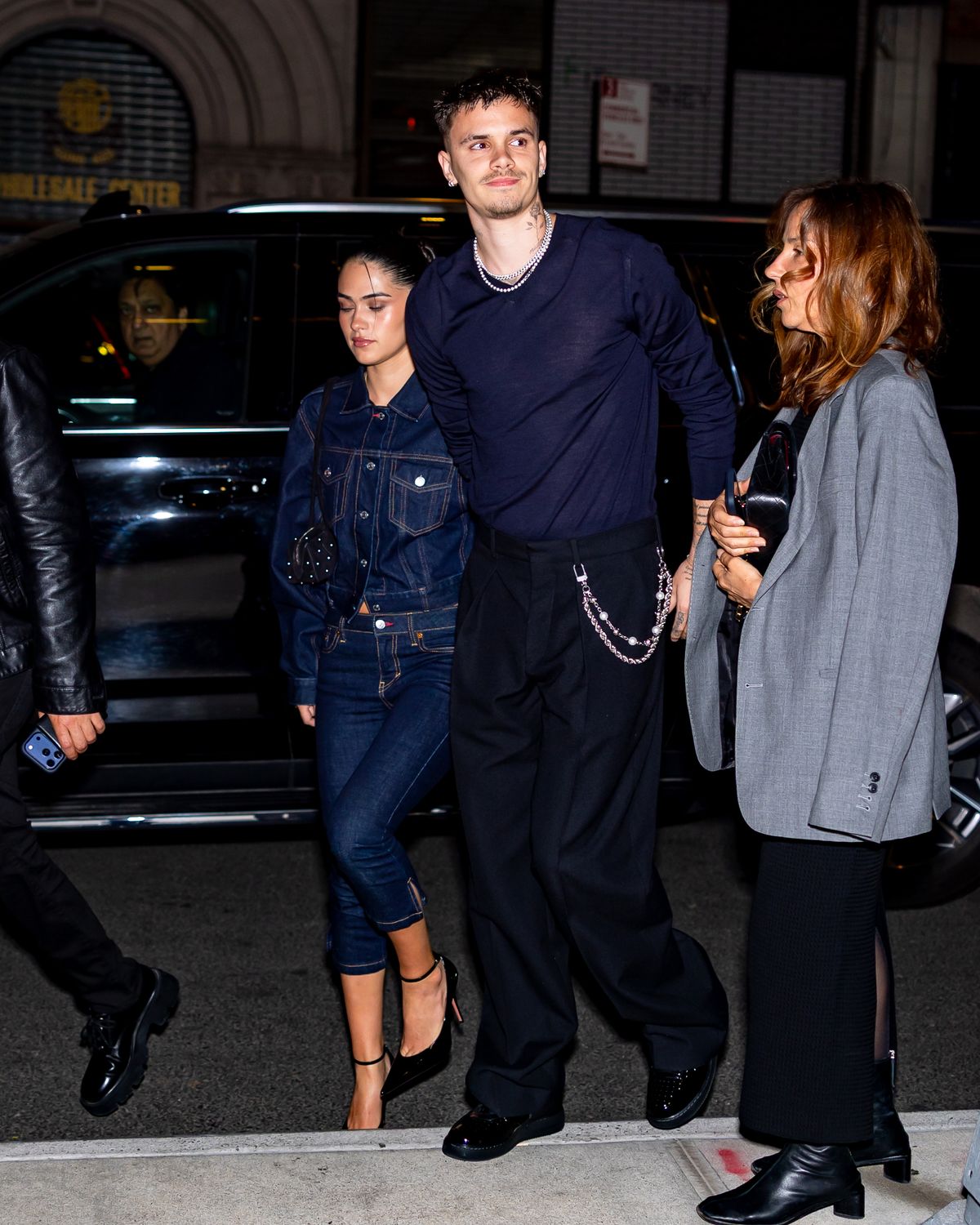 Romeo Beckham with girlfriend Kim Turnbull