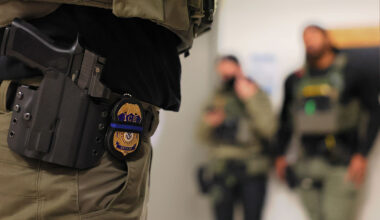 An ICE officer's badge