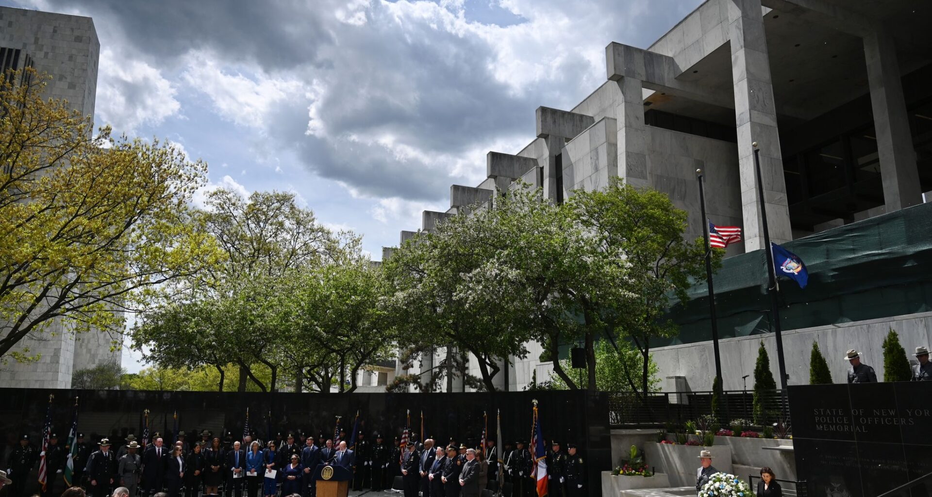 The names of fallen New York police officers are read during the state's annual Remembrance Ceremony of officers on Tuesday at the New York State Police Officers Memorial at Empire State Plaza in Albany. Fifty-six police officers from eight departments who died in the line of duty or related to their service were honored. Sgt. Christopher M. Filli of the Hudson City Police Department and Deputy Bernard A. Roberts of the Columbia County Sheriff’s Office were among the names added to the memorial wall. (Will Waldron/Times Union)