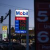 Gasoline prices are displayed at a Mobil gas station on April 29 in Portland, Ore.