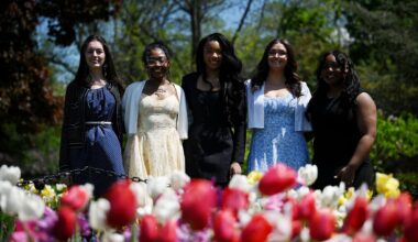 2026 Tulip Queen finalists; Olivia Rose, left, Trinity Tarver, Phylicia Hinton, Alexis Savoie and Syaira Liverpool, right, pose for a photo in the tulip beds at Washington Park on Thursday, May 7, 2026, in Albany, N.Y. (Will Waldron/Times Union)
