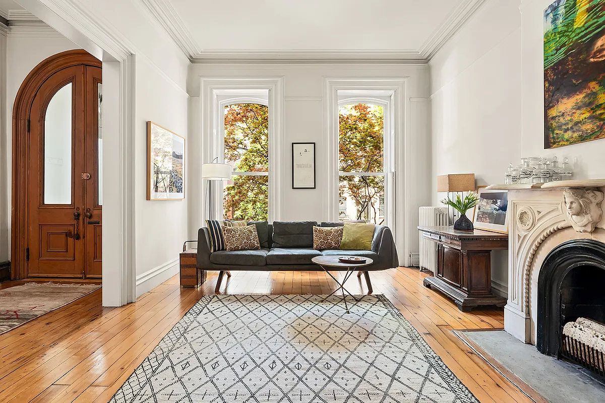 brooklyn open house - a parlor with a marble mantel