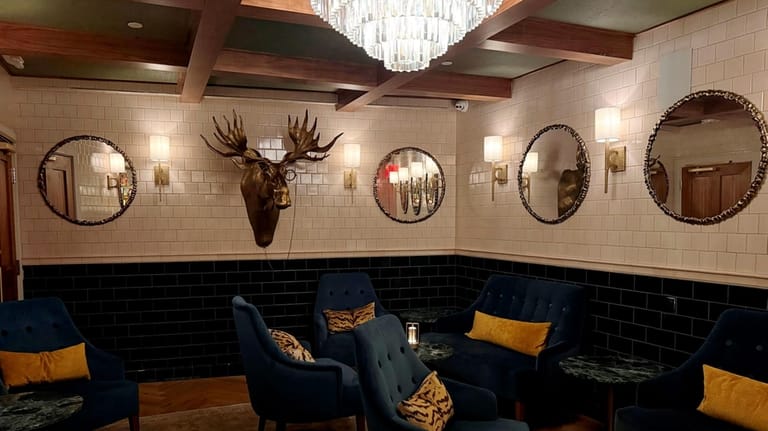Inside Jesse Schenker's Bull Moose, a members-only lounge behind his...