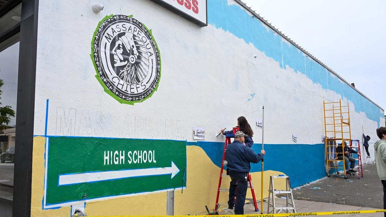 Mural next to Massapequa High School being repainted but still shows 'Chiefs' mascot