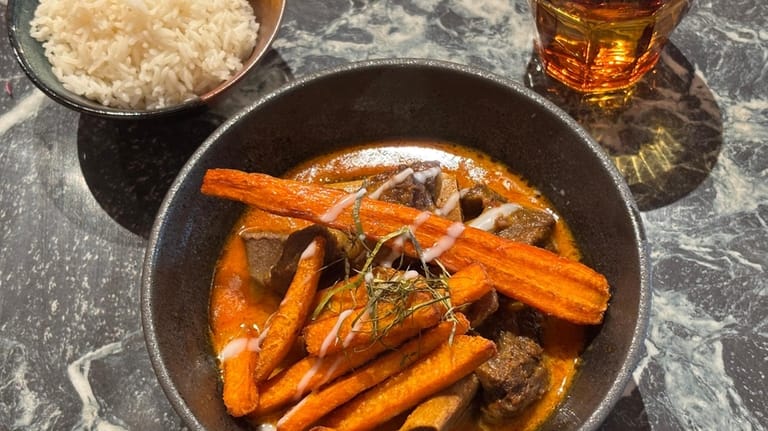 The beef short rib panang has very tender chunks of...
