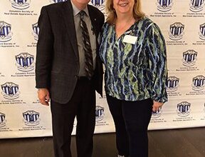 Paul Halvatzis of Amorelli Realty with Jenn DeFlorio, Ex­ecutive Director of the Columbia Society of Real Estate Ap­praisers.