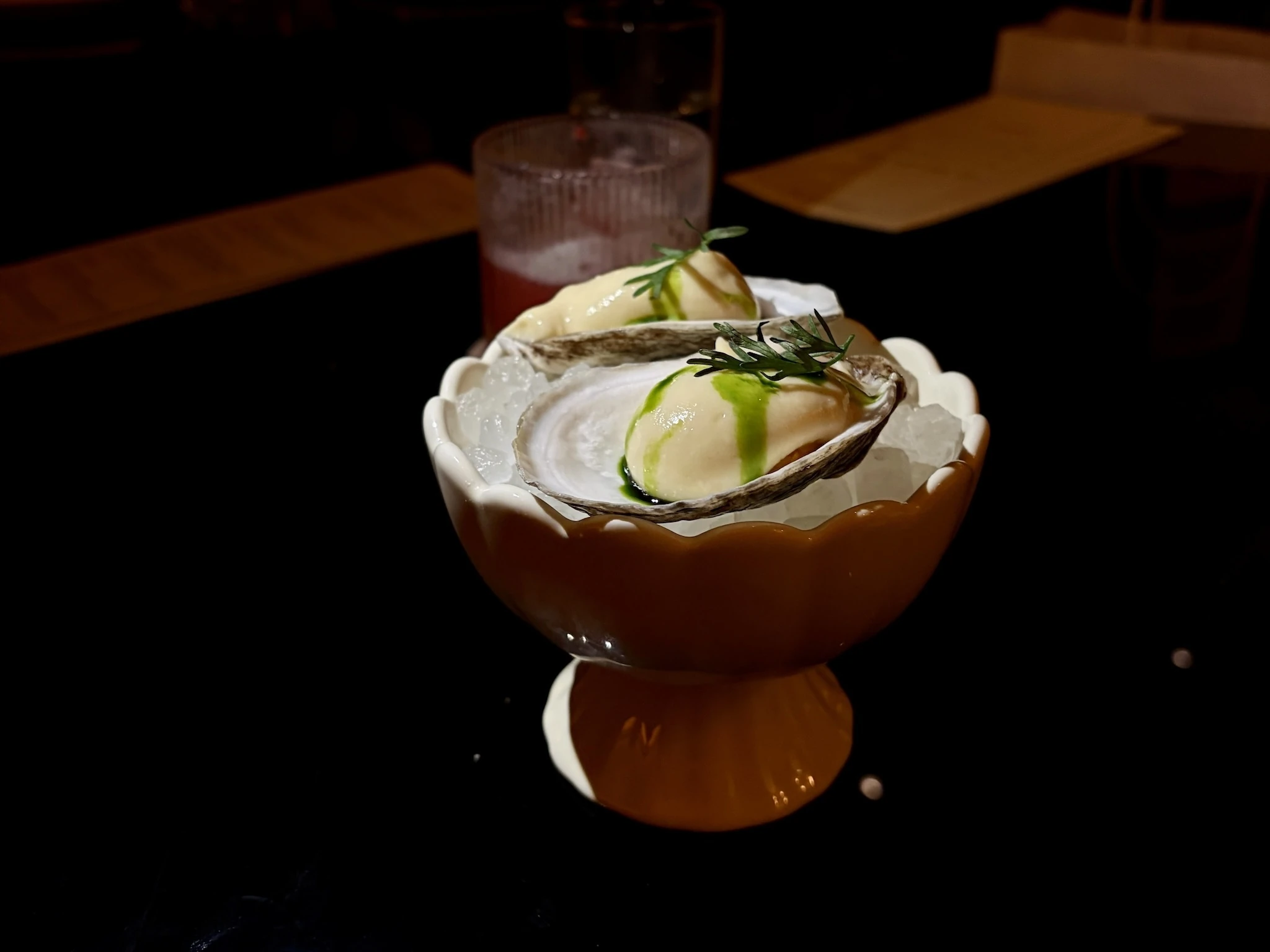 Two dollops of ice cream in a oyster shell