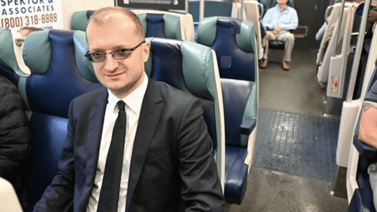 Attorney Ihor Stratan, 39, of Farmingdale at the train in...
