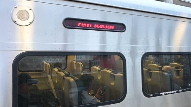 Commuters wait for the train to leave the LIRR Ronkokoma...