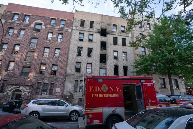 An FDNY vehicle is pictured outside an apartment building on Bainbridge Ave. in the Bronx after a fatal fire on Monday, May 11, 2026. (Barry Williams/ New York Daily News)