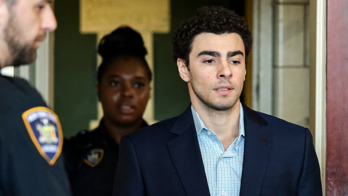 Luigi Mangione arriving at Manhattan Supreme Court building in New York City
