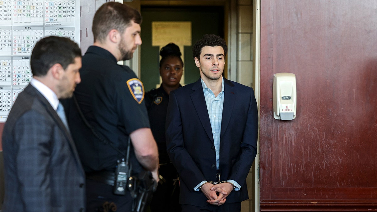 Luigi Mangione arriving at Manhattan Supreme Court building in New York City