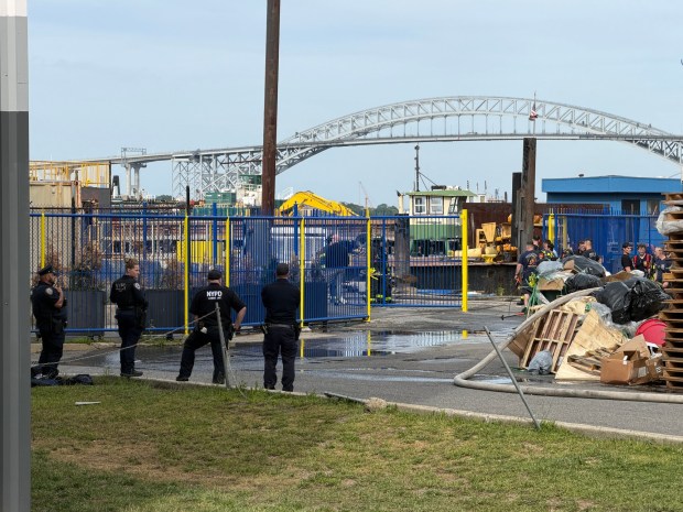Emergency responders are pictured after an explosion and fire at a shipyard on Richmond Terrace between Lockman and Andros Aves. on Staten Island on Friday, May 22, 2026. (Rose Abuin / New York Daily News)
