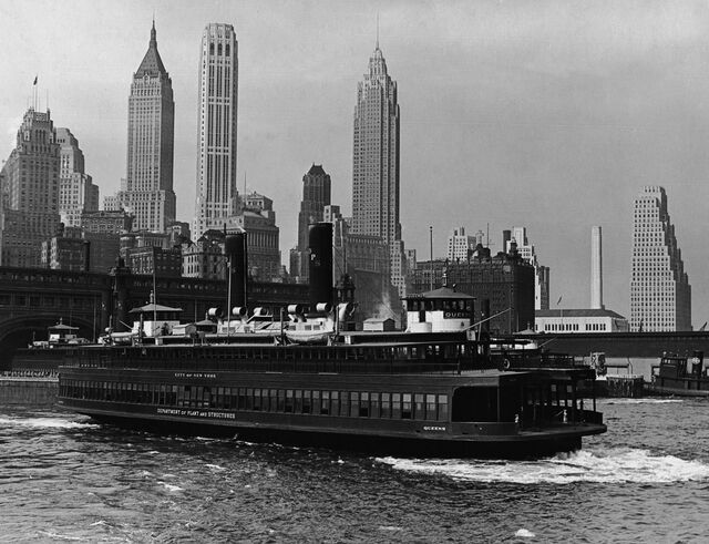 A ferryboat pulls out of the dock at the terminal near Battery Park in 1932, in New York.