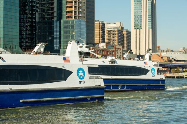 Boats from the NYC Ferry fleet on the river
