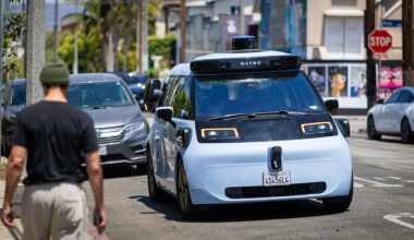 Waymo's new autonomous vehicle, called the Ojai, drives in Venice Beach, California, on May 27. The all-electric vehicle is expected to begin limited rides with select customers in Los Angeles, San Francisco and Phoenix in the coming weeks. 