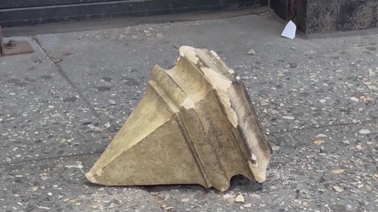 Large piece of a building facade falls onto teen in Queens