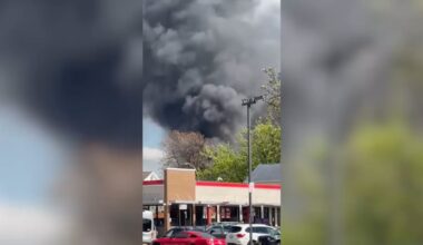 Massive fire tears through building in Queens