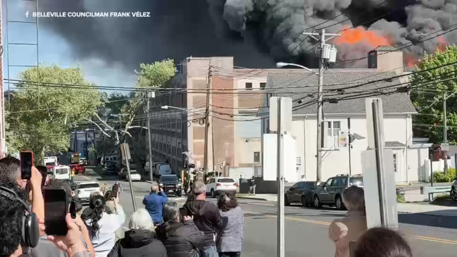 Plumes of smoke fill the air after fire tears through warehouse in Belleville, New Jersey