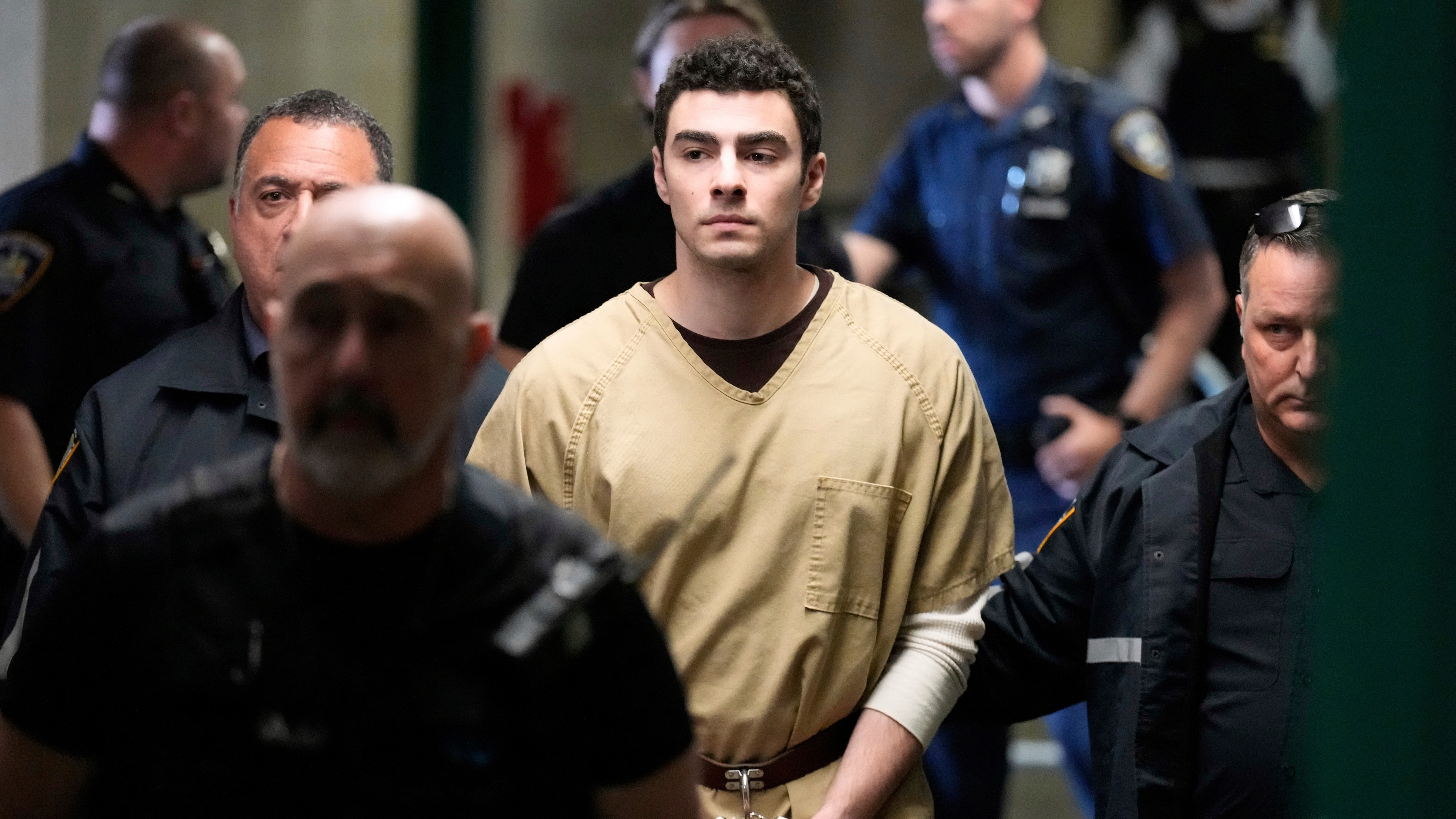 Luigi Mangione is escorted into Manhattan state court in New York, Sept. 16, 2025. 
