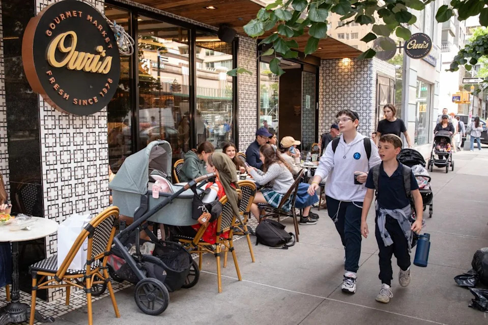 On any given day, the sidewalk outside Ouri’s is often filled with crowds of strollers and students. Olga Ginzburg for the N.Y. Post