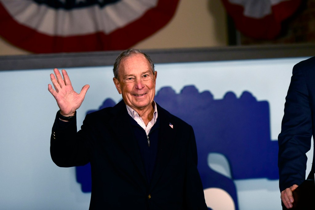 Democratic Presidential candidate Michael Bloomberg waves to supporters from his newly opened Philadelphia field office on December 21, 2019 in Philadelphia, Pennsylvania. 