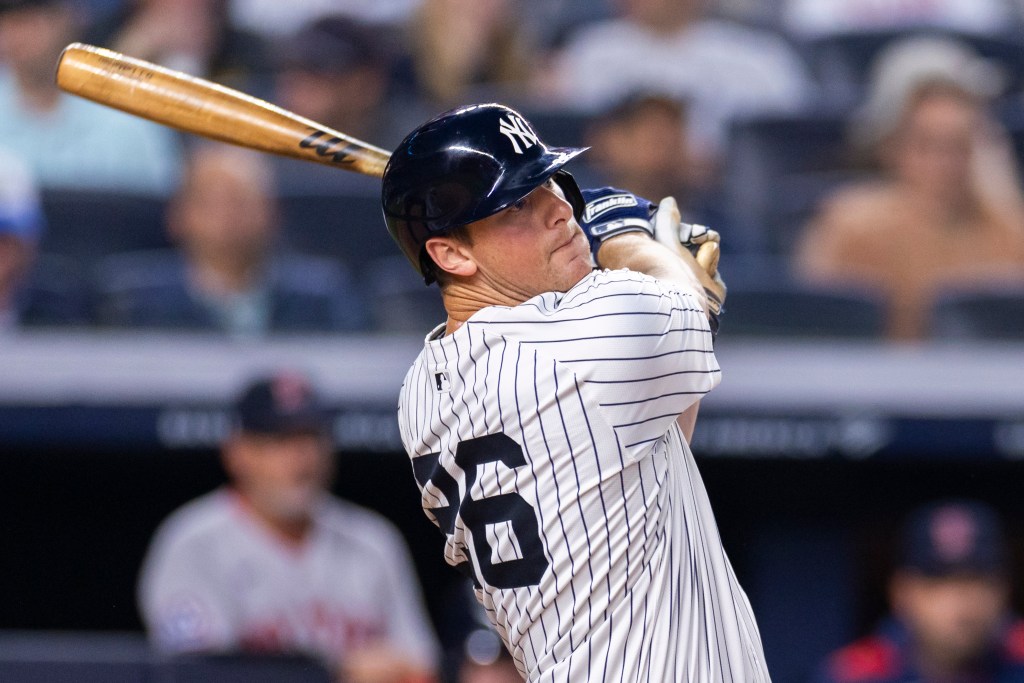 DJ LeMahieu #26 of the New York Yankees hits a solo homer during the fifth inning against the Boston Red Sox at Yankee Stadium, Sunday, June 8, 2025, in Bronx, NY. (