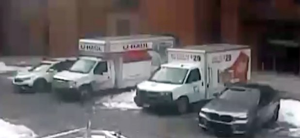 Once the storage unit was rented, the Home Depot truck was backed up to a loading area where the unit was located, with another vehicle and, later, a U-Haul truck andthe CRV parked alongside. The storage unit was used to facilitate transferring the stolen merchandise from the Home Depot truck to the U-Haul truck and the other vehicle, seen above on the far right of the picture. (USDOJ)