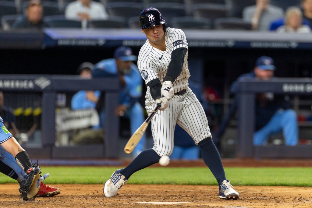 New York Yankees shortstop Anthony Volpe (11) strikes out swinging during the fifth inning against the Toronto Blue Jays