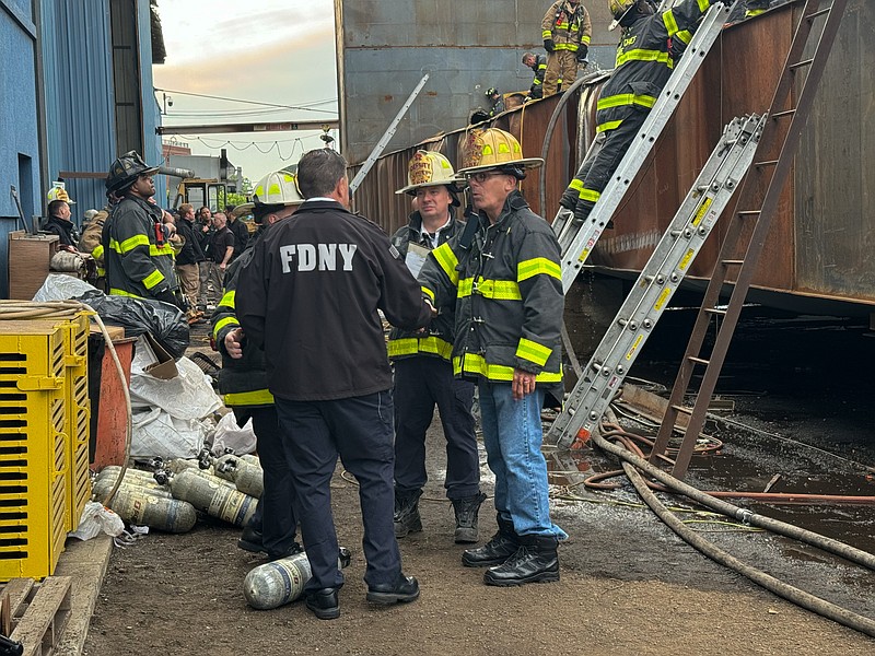 Firefighters respond to an explosion at a shipyard in Staten Island on Friday, May 22, 2026 in New York. (Staten Island Advance via AP)