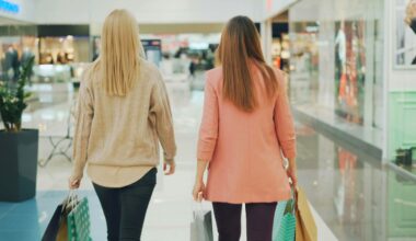 two women walking through a shopping mall