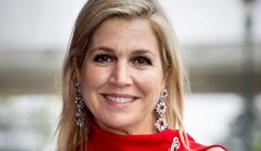Queen Máxima embraces polished feminine silhouette in bold yellow ensemble with luminous beauty look