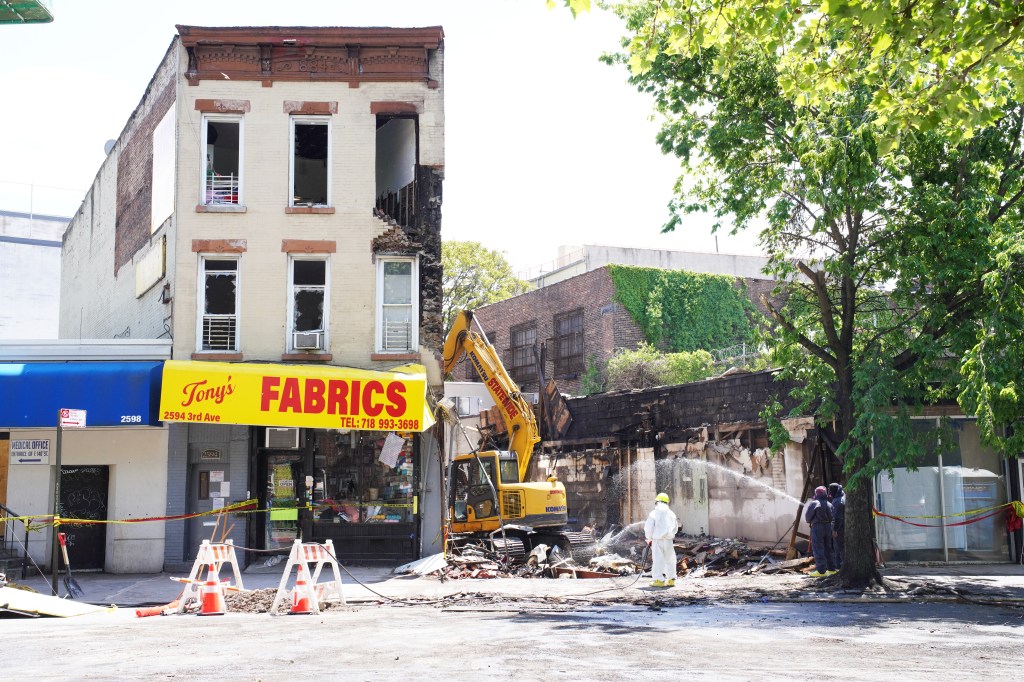 Damage to buildings after a fatal fire at 2592 Third Avenue in the Bronx, New York.