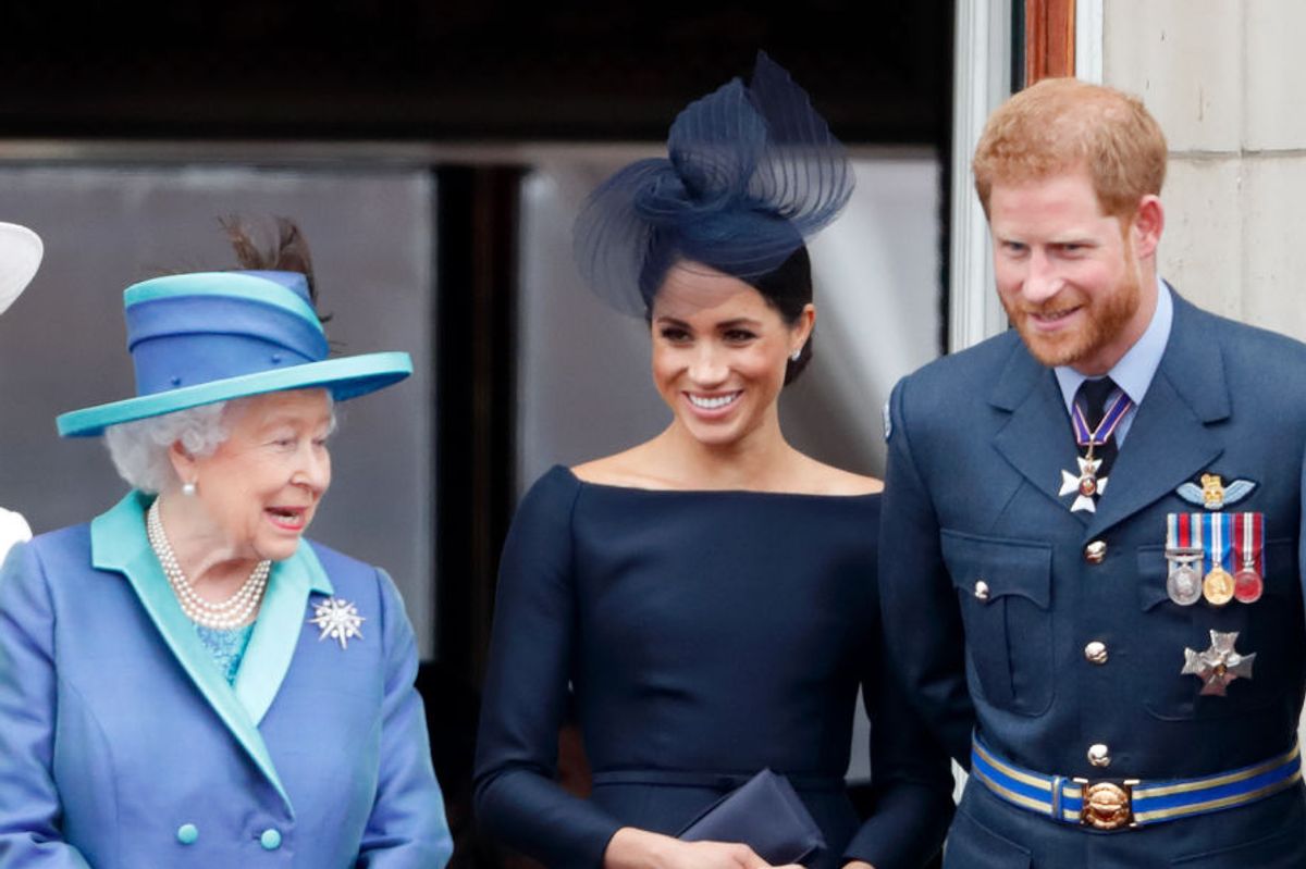 Prince Harry and Meghan Markle with Queen Elizabeth on the Palace balcony