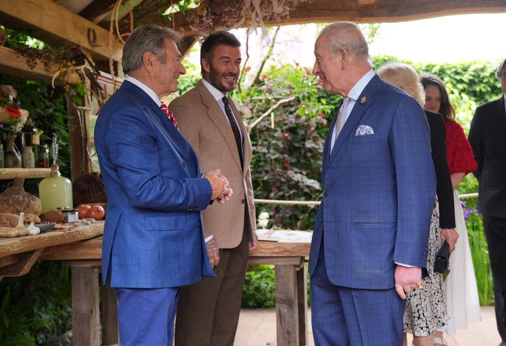 King Charles III meets Sir David Beckham and Alan Titchmarsh (L) during the press day ahead of the 2026 RHS Chelsea Flower Show at The Royal Hospital Chelsea on May 18, 2026 in London, England