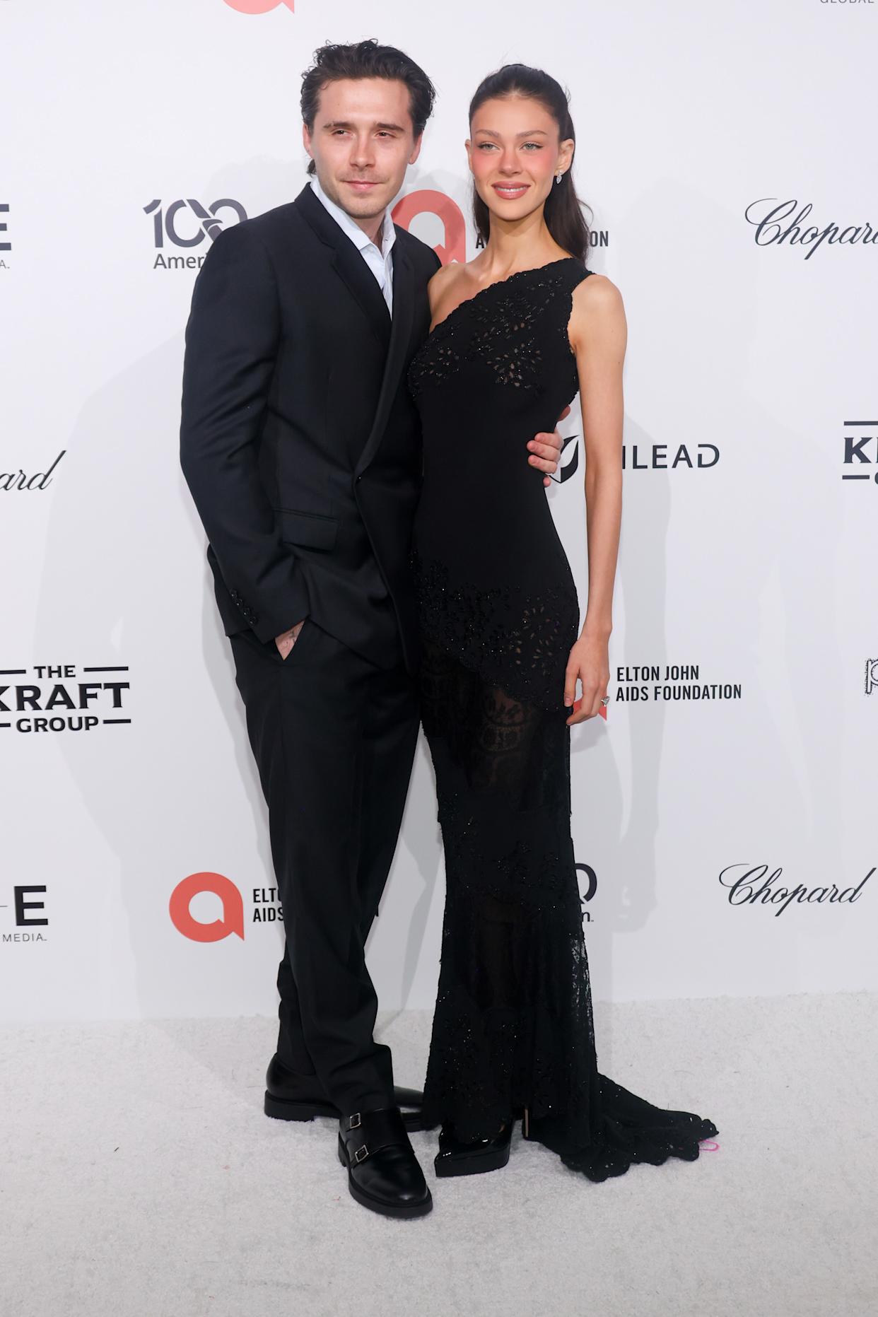 The former photographer accused his parents of trying to sabotage his marriage to Nicola Peltz (seen above). FilmMagic