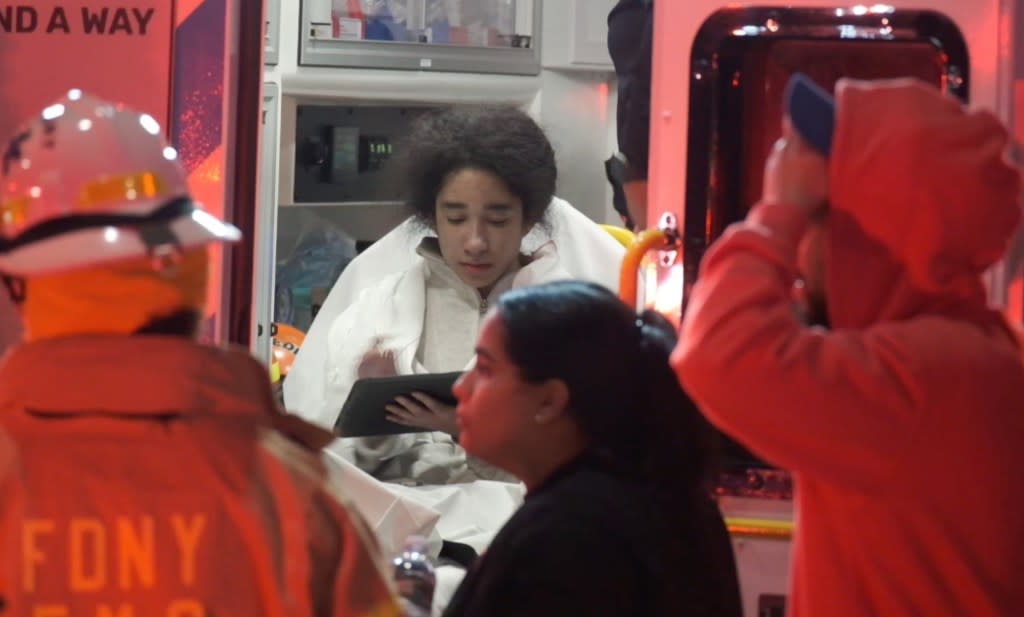 A person is treated at the scene of a fatal fire in Inwood on Monday, May 4, 2026. FNTV