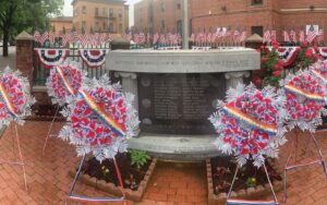 Wreaths at the Vietnam War Memorial at the corner of Woodside Avenue and 57th Street.