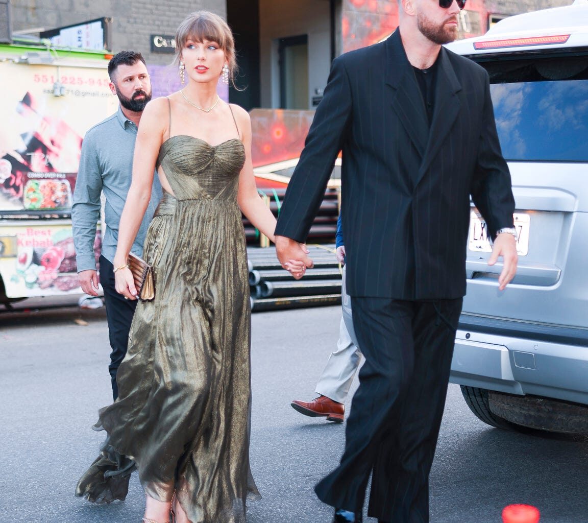 Taylor Swift Wears Travis Kelce’s Blazer Over Bronze Cutout Gown in NYC