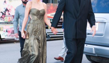 Taylor Swift Wears Travis Kelce’s Blazer Over Bronze Cutout Gown in NYC