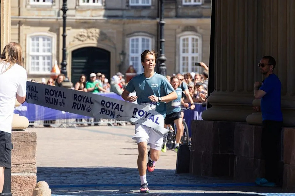 Prince Vincent of Denmark crosses the finish line after the One Mile Family Mile during the Royal Run in Copenhagen, Denmark, on May 25, 2026