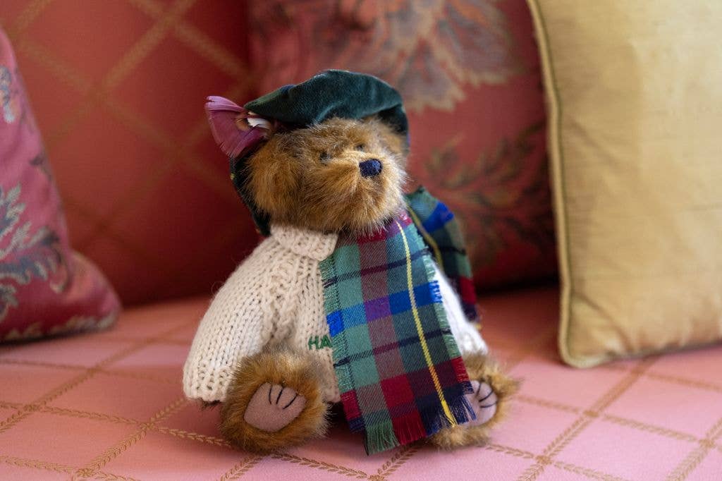 A teddy bear sitting on a chair