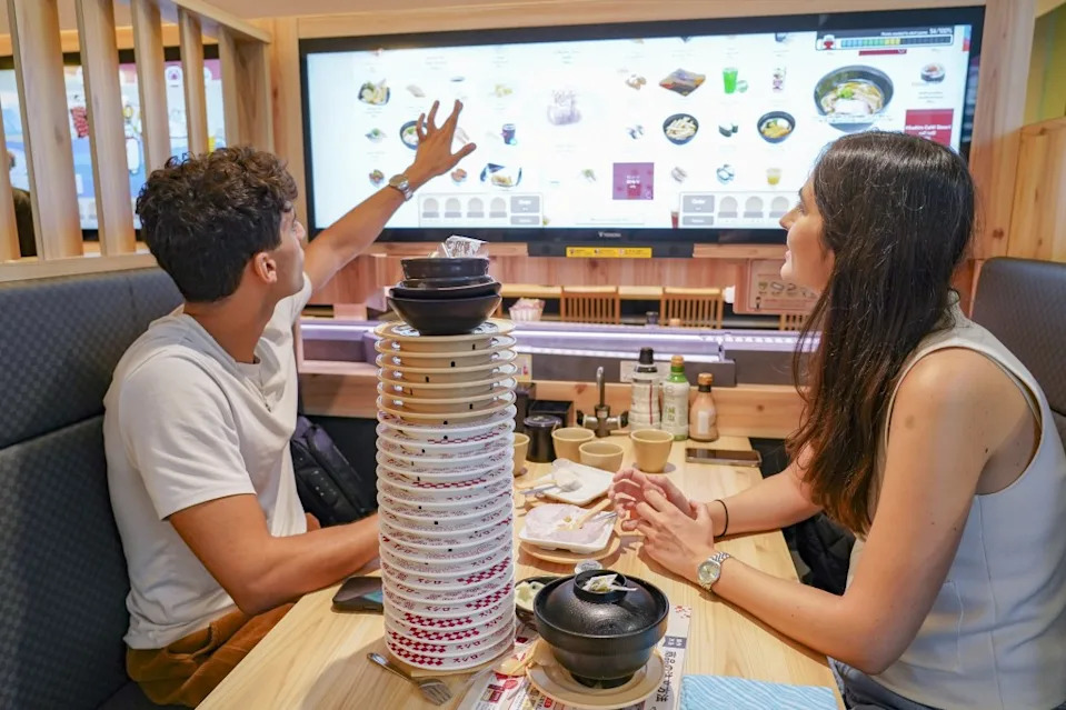 Sushiro touts their mission to make sushi affordable. Bloomberg via Getty Images