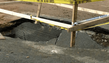 Dump truck falls into sinkhole in Brooklyn: FDNY